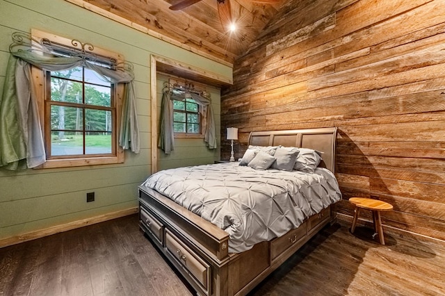 bedroom with dark hardwood / wood-style floors, lofted ceiling, wooden walls, and wooden ceiling