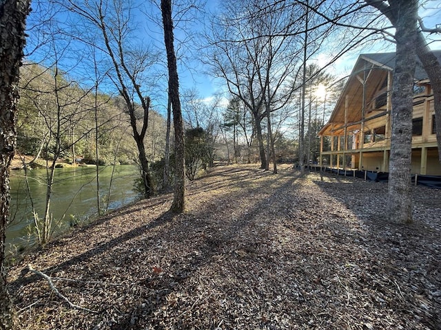 view of yard featuring a water view