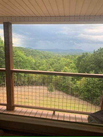 balcony with a wooded view