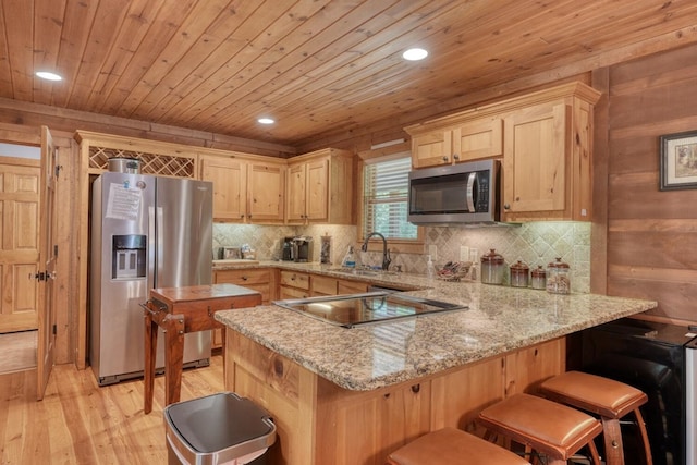 602 Mill Ridge Rd, Hiawassee, GA 30546 - kitchen with stainless steel appliances, a peninsula, wood ceiling, light wood-style floors, and light brown cabinetry