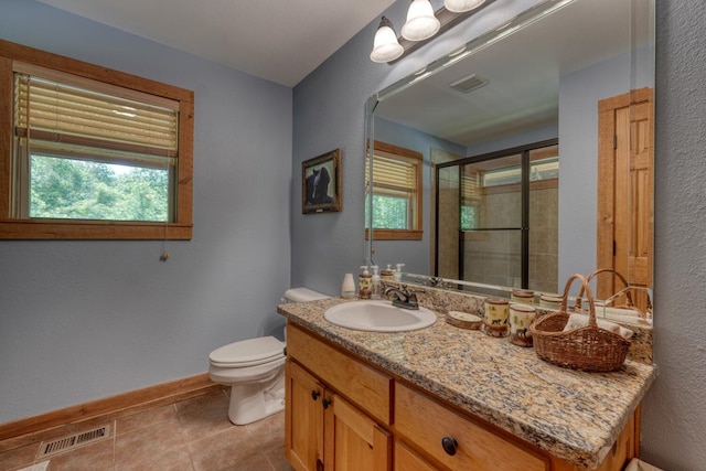 602 Mill Ridge Rd, Hiawassee, GA 30546 - bathroom featuring toilet, baseboards, a shower stall, vanity, and tile patterned floors
