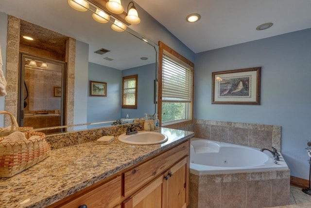 602 Mill Ridge Rd, Hiawassee, GA 30546 - full bathroom with vanity, a tub with jets, a shower stall, and recessed lighting