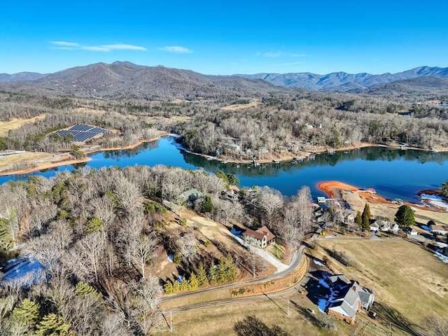 aerial view featuring a water and mountain view