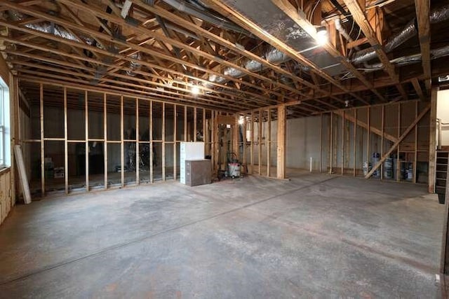 misc room with concrete flooring