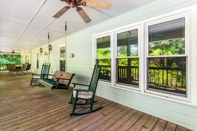 wooden terrace with ceiling fan