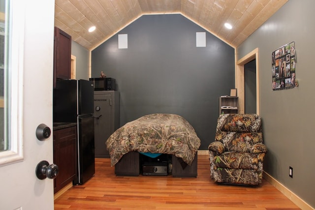 living area with lofted ceiling, wooden ceiling, light wood-type flooring, and baseboards