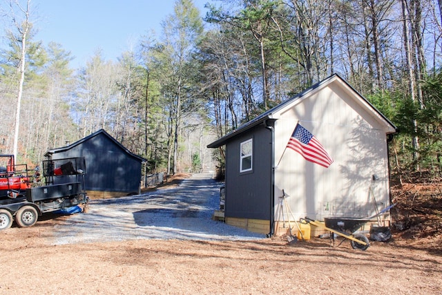 view of outdoor structure with driveway