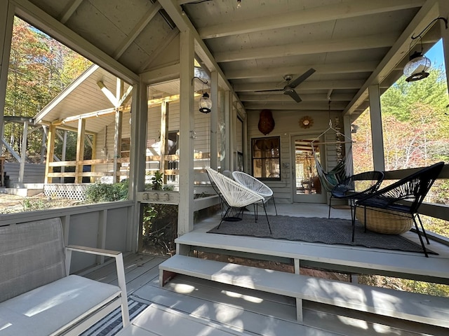 exterior space featuring ceiling fan