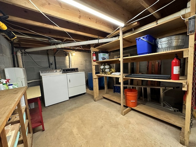 basement with washing machine and dryer