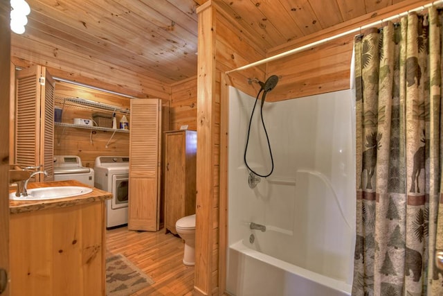 full bathroom featuring shower / tub combo with curtain, wood ceiling, wood-type flooring, separate washer and dryer, and wood walls