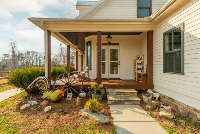 doorway to property featuring covered porch