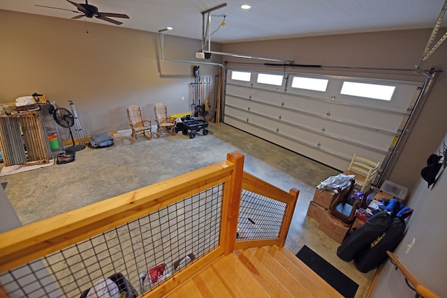 garage featuring a garage door opener and recessed lighting