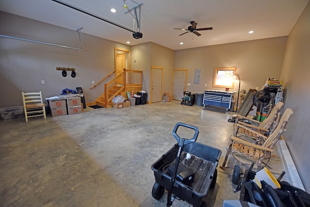 interior space featuring electric panel, a ceiling fan, and recessed lighting