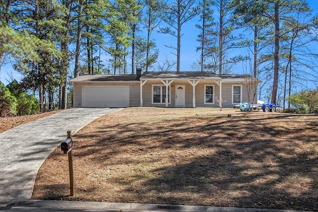 view of front of property with an attached garage and driveway