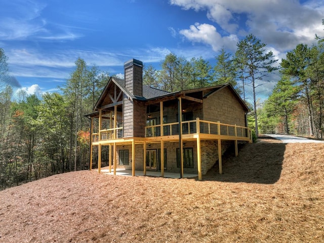 rear view of house featuring a patio area