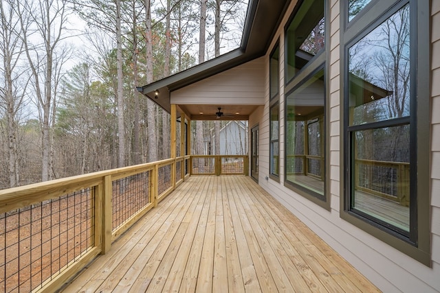 wooden terrace with ceiling fan