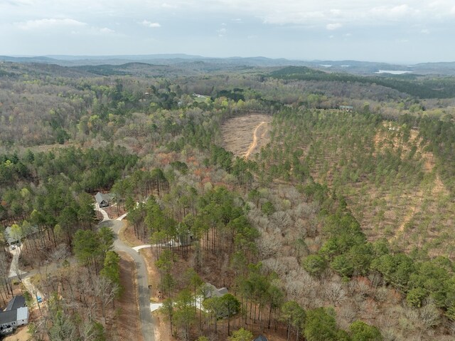 bird's eye view featuring a forest view