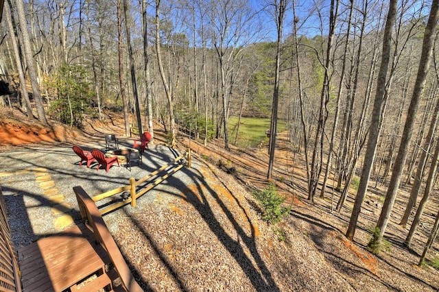 view of yard with a forest view