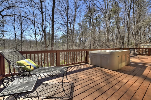 wooden terrace with a jacuzzi