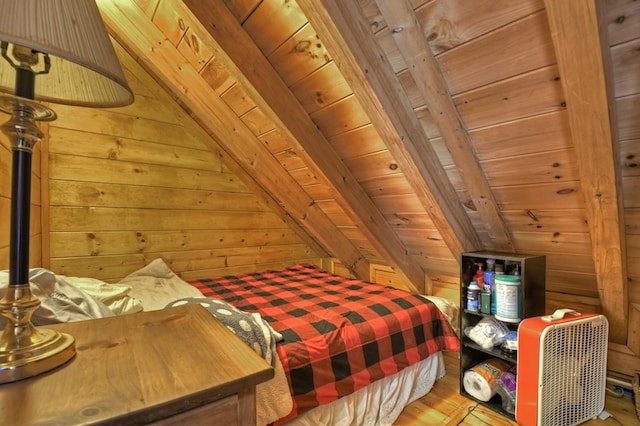 bedroom with wood walls, wooden ceiling, lofted ceiling with beams, and wood finished floors