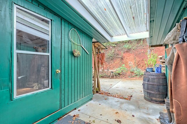 property entrance with a patio area