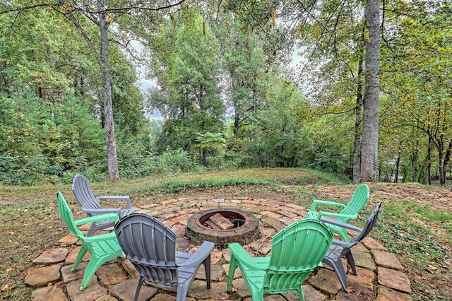 view of patio with a fire pit