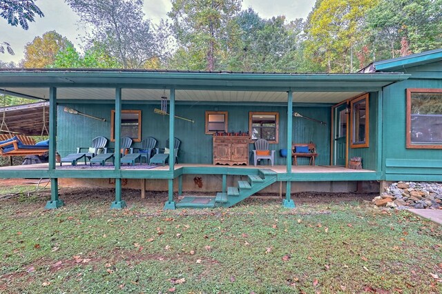 entrance to property with a yard