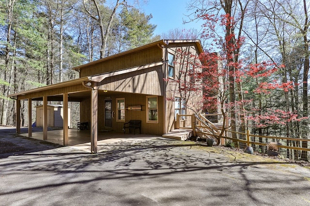 exterior space featuring a carport