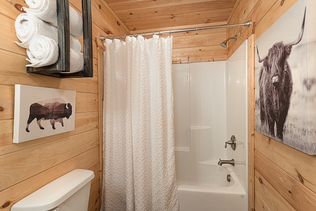 bathroom featuring shower / tub combo with curtain, wooden ceiling, wooden walls, and toilet