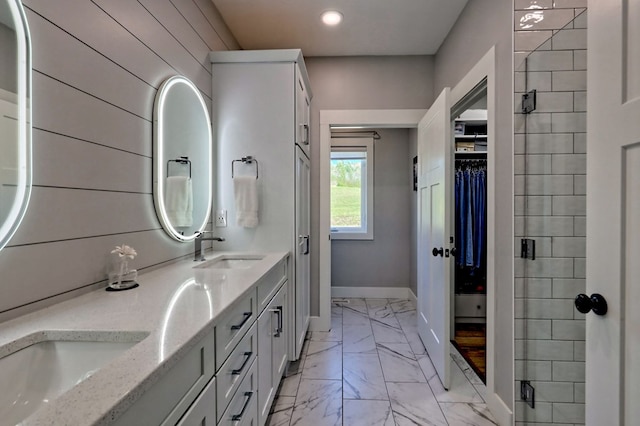 bathroom featuring vanity and walk in shower