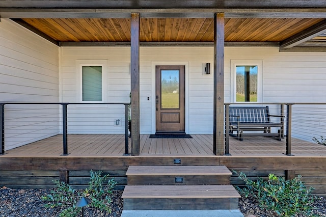 property entrance featuring covered porch