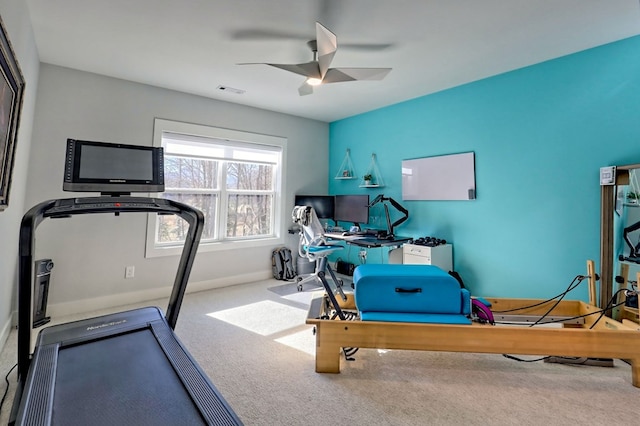 workout area with carpet flooring and ceiling fan