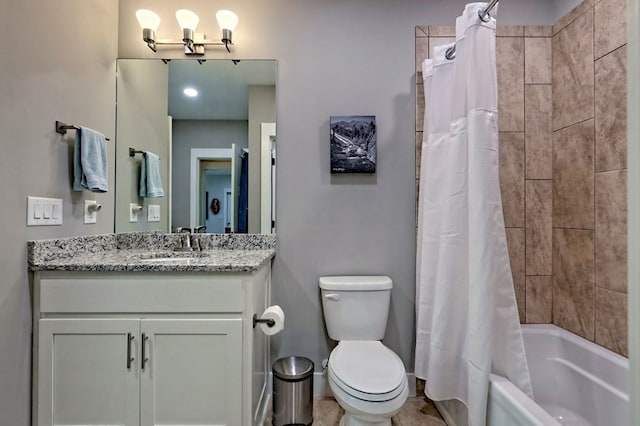 full bathroom with shower / bath combo with shower curtain, vanity, and toilet