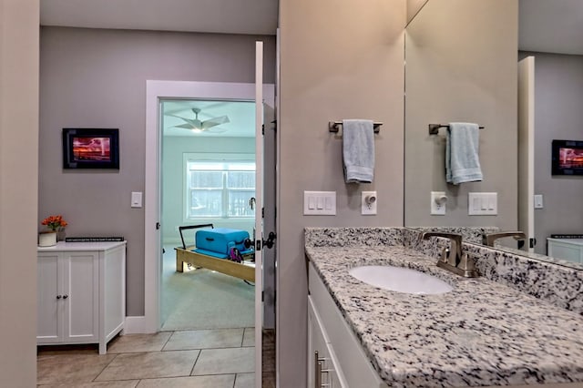 bathroom with tile patterned flooring and vanity