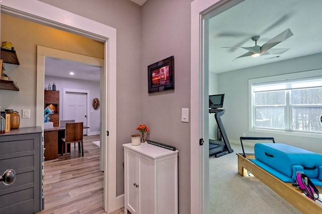 hallway featuring light wood-type flooring