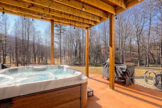 view of patio with a hot tub