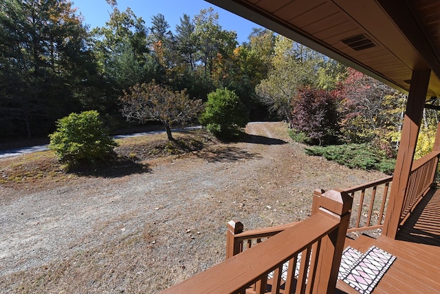 view of yard featuring a deck