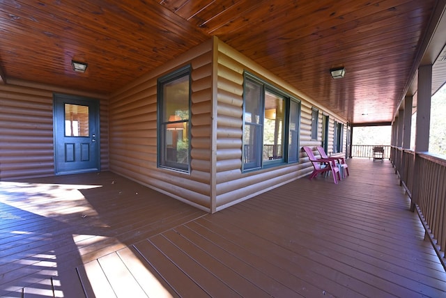 wooden terrace with covered porch