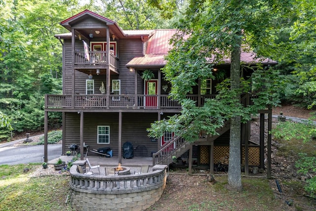 284 Summit Way, Blairsville, GA 30512 - back of house with a fire pit, a patio, a balcony, a deck, and stairs