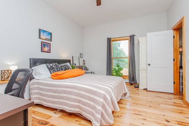 bedroom featuring ceiling fan and light hardwood / wood-style floors