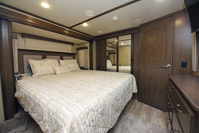 bedroom with light hardwood / wood-style flooring