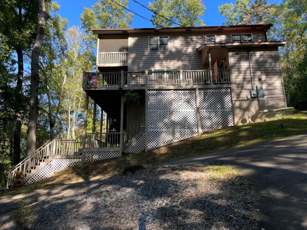 view of side of property featuring a deck