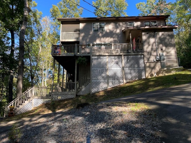 view of side of property featuring a deck