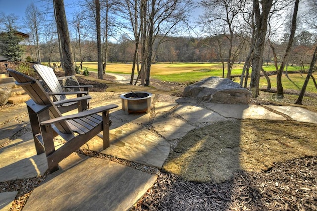 exterior space with a fire pit