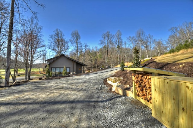 view of street featuring driveway