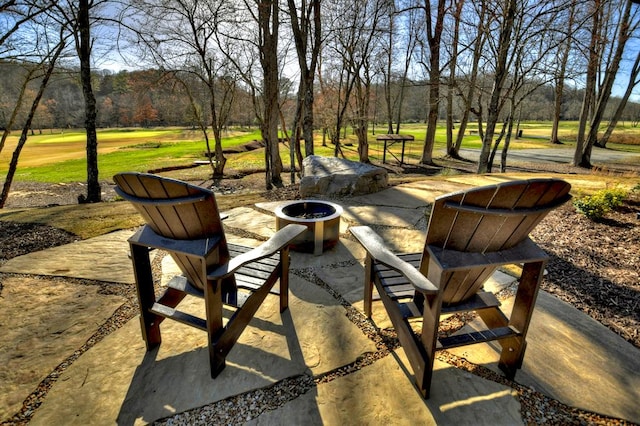 view of patio / terrace featuring a fire pit