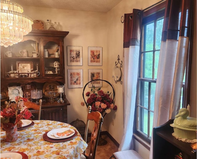 dining room featuring a chandelier