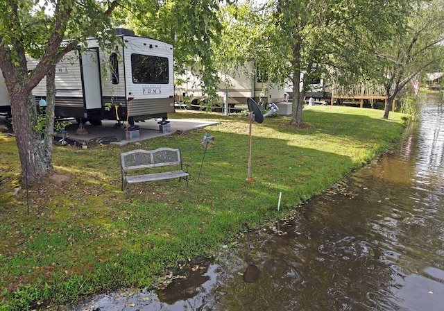 view of yard with a water view