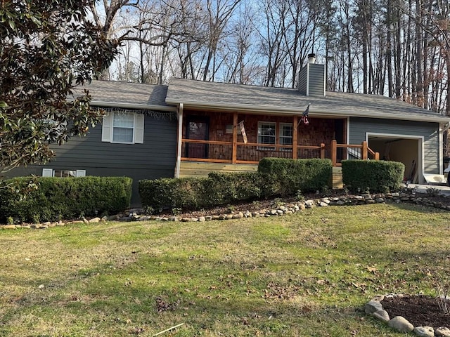 ranch-style home featuring a front yard and covered porch