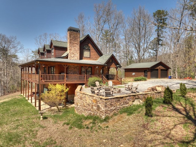 back of property featuring a garage